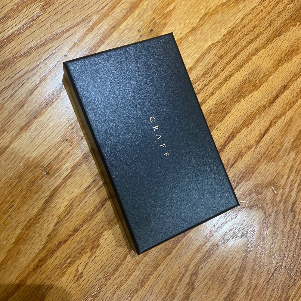Brand new. Graff box with jewelry bag